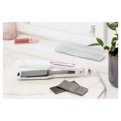 Juuksesirgendaja/...